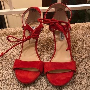 Red Steve Madden heels with small lace up detail